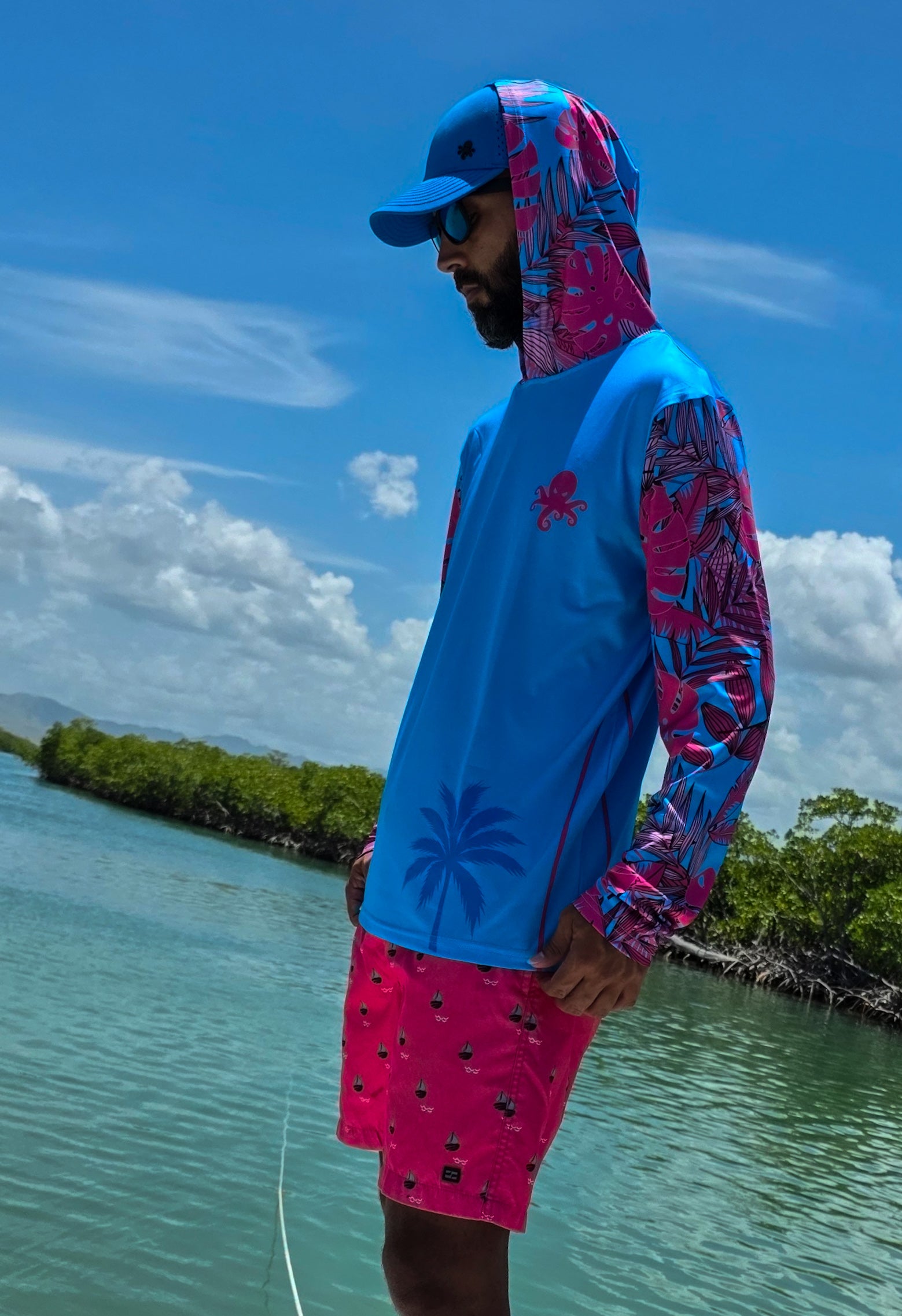 Rashguard con capucha para hombre – protección solar con estilo vibrante tropical"

"Camiseta deportiva UV con diseño caribeño – ideal para navegar, surfear o explorar la costa"

"Prenda versátil y ligera con estampado tropical – protección contra el sol sin sacrificar estilo"

"Ropa acuática premium para climas cálidos – rashguard con flow isleño"

"Rashguard Blue Reef con diseño único para aventuras al sol – confort y protección en uno"

Disenado en puerto rico
Marca local d epuerto rico